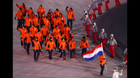 Dutch athletes enter the stadium.