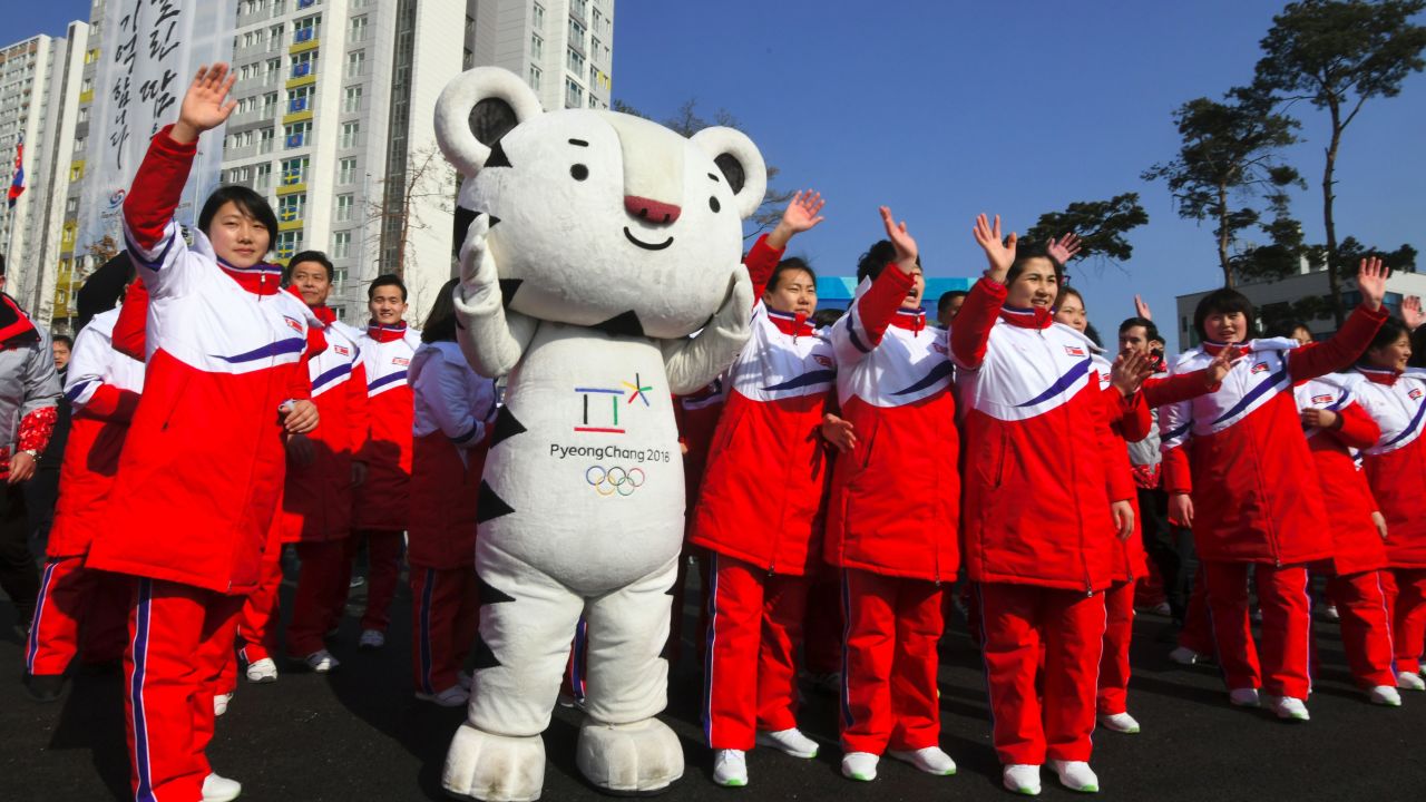 North Korean athletes take part in a welcoming ceremony for the team at the Olympic Village in Gangneung on February 8.