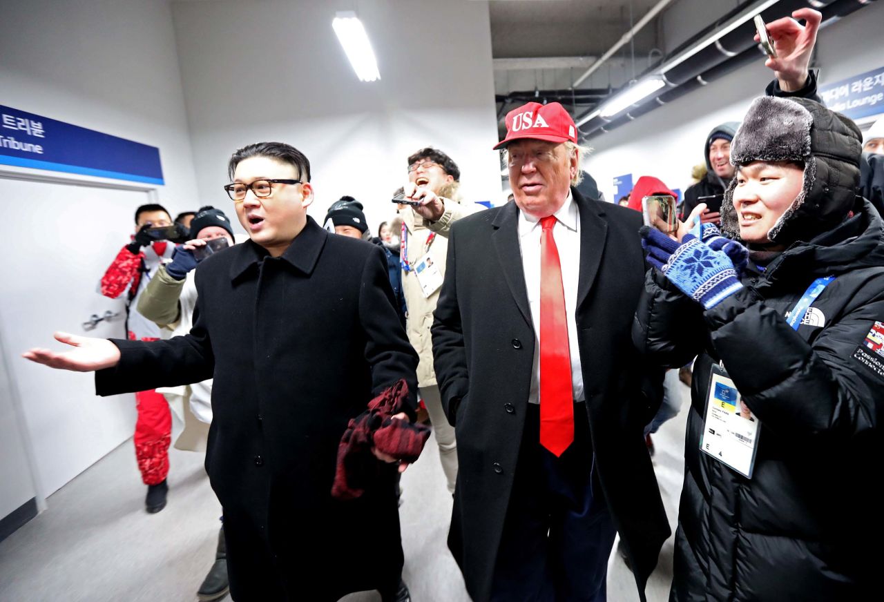 Impersonators of Kim Jong Un and US President Donald Trump are escorted out of the stadium.