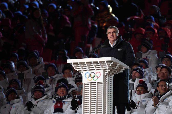 Thomas Bach, the president of the International Olympic Committee, speaks before the lighting of the cauldron.