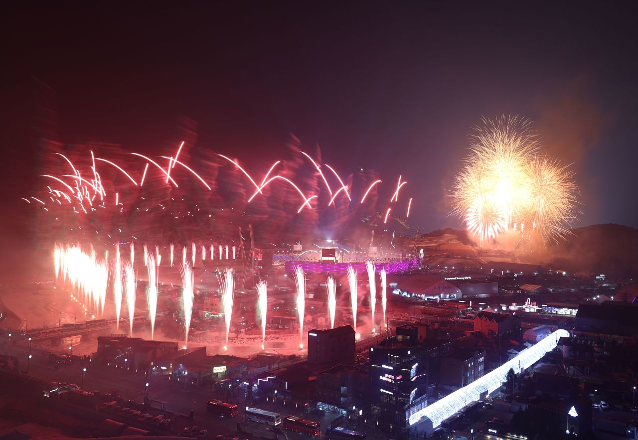 Fireworks explode over the stadium.