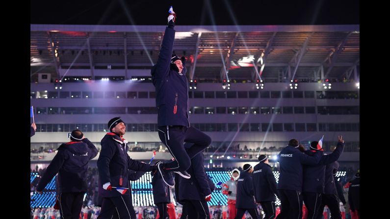 France's athletes take part in the parade of nations.
