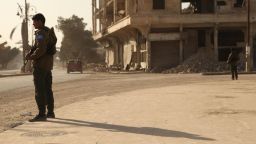 Members of the newly formed RISF or Raqqa Internal Security Force stand guard on a street. This newly formed force falls under the jurisdiction of the civilian administration of Raqqa and is meant to function like a police force.