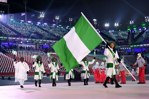 Flag bearer Ngozi Onwumere and teammates enter the stadium during the Opening Ceremony of the PyeongChang 2018 Winter Olympic Games.