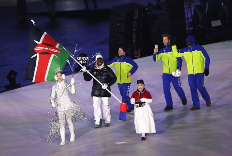 Sabrina Simander is the flag bearer of Kenya. Simader was born in Kenya to an Austrian father and Kenyan mother. She moved to Austria when she was young and learnt to ski there.