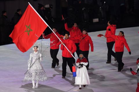 Moroccan teammates enter the stadium during the Opening Ceremony of the PyeongChang 2018 Winter Olympic Games. Alpine skier Adam Lamhamedi is the second Moroccan athlete.  