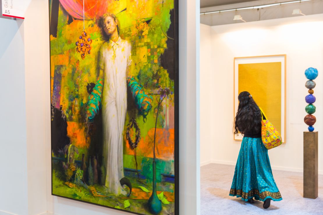 A woman roams through last year's India Art Fair.