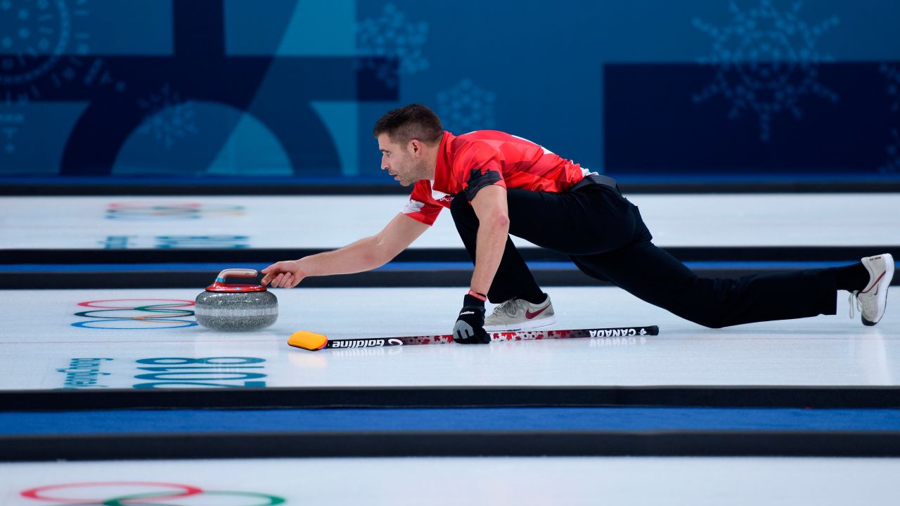 Canada's John Morris competes in the mixed curling round robin against Switzerland.