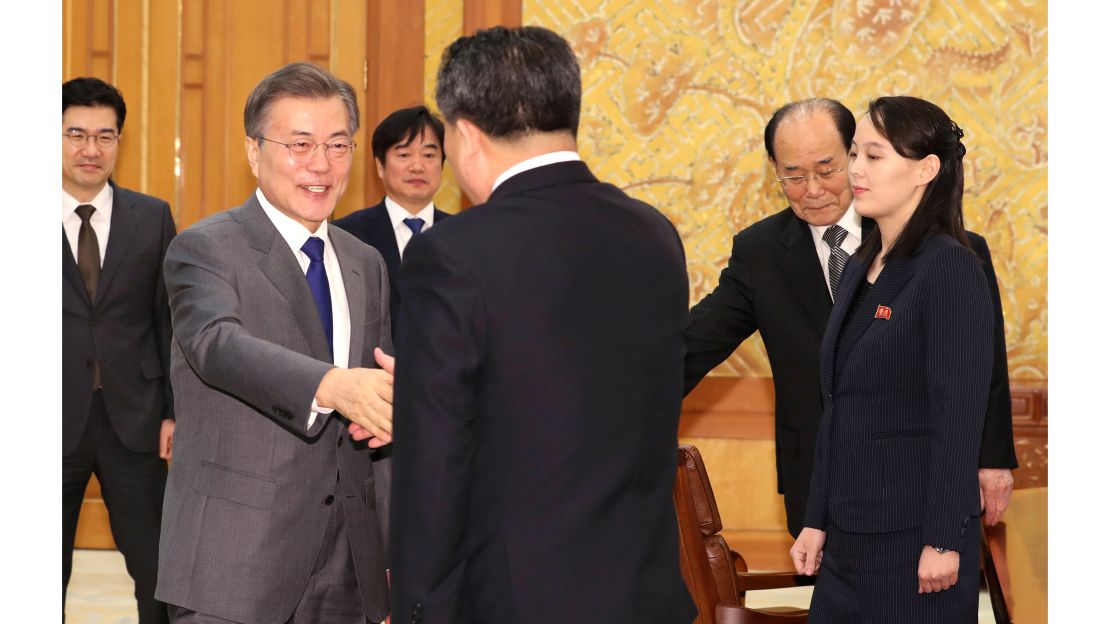 South Korean President Moon Jae-in, left, shakes hands with Ri Son Gwon, North Korea's chief negotiator, as Kim Yo Jong, right, sister of North Korean leader Kim Jong Un, and Kim Yong Nam, North Korea's nominal head of state, stand during a meeting Saturday at the presidential palace.