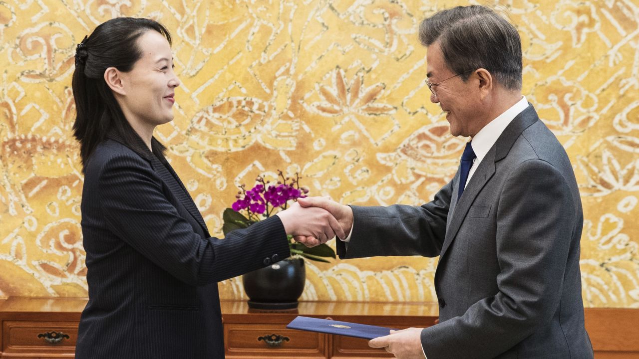 South Korean President Moon Jae-in, right, shakes hands with Kim Yo Jong, North Korean leader Kim Jong Un's sister.
