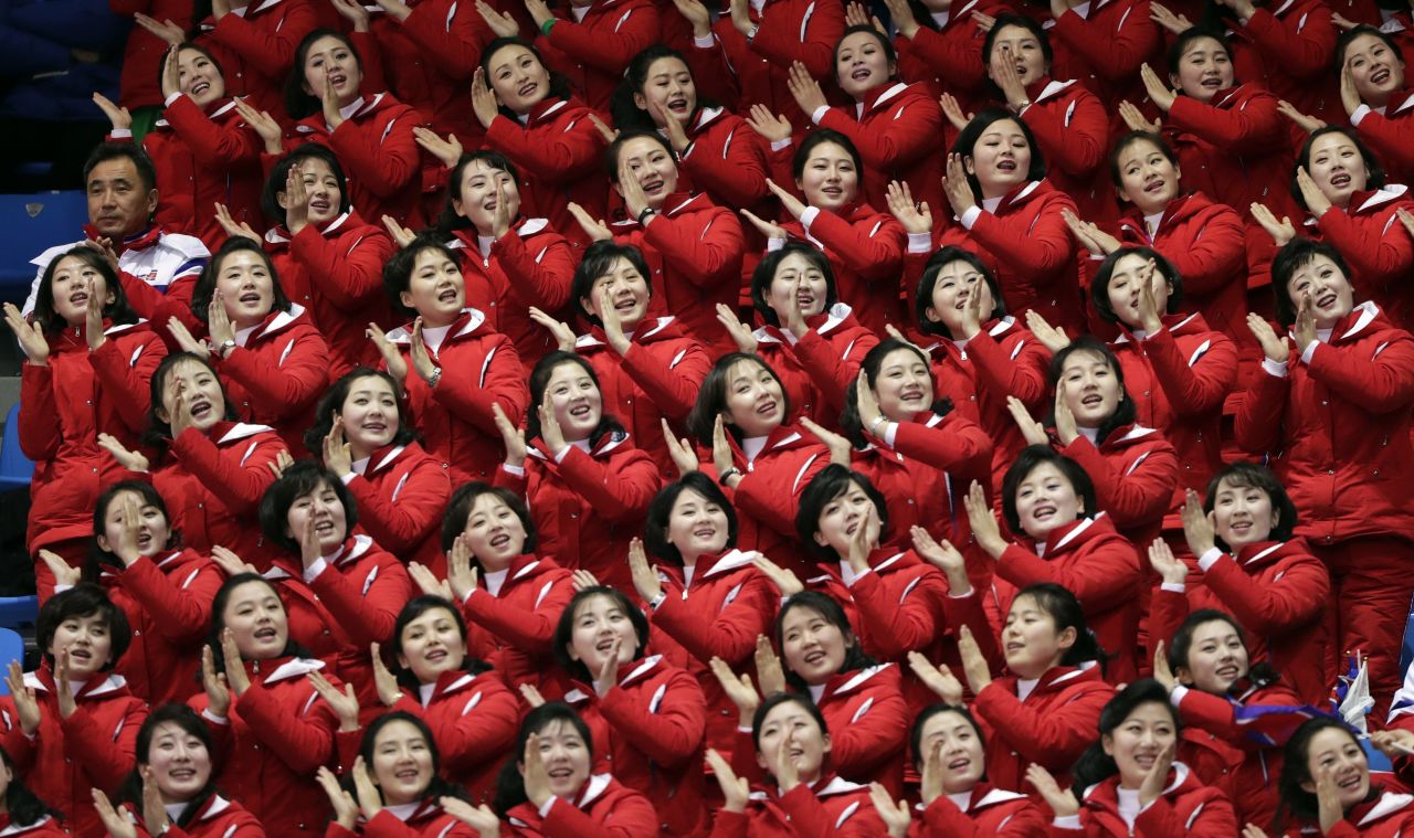 North Korean fans cheer as they watch a short track speedskating race. Choe Un-song was competing in the 1,500 meters. He is one of 22 North Koreans who will be taking part in the Winter Games in Pyeongchang.