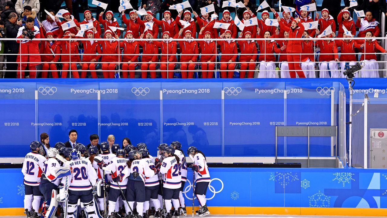 North Korean cheerleaders enthusiastically root for Korea during a match against Switzerland.