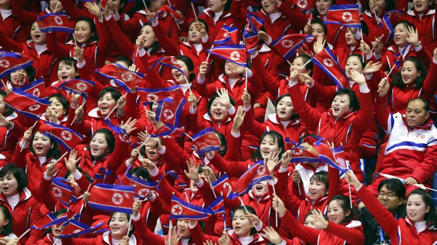 North Korean fans cheer, during the men's 1500 meters in the Gangneung Ice Arena at the 2018 Winter Olympics in Gangneung, South Korea, Saturday, February 10, 2018. 