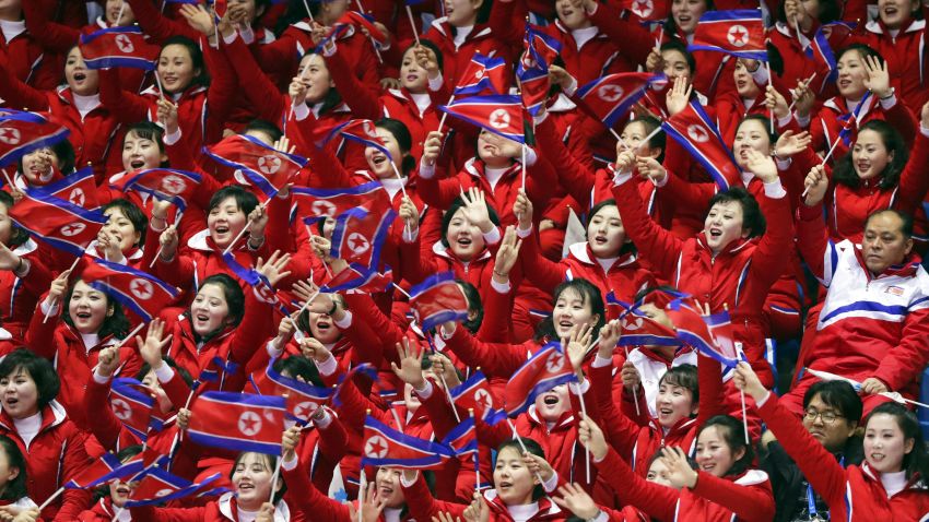 North Korean fans cheer, during the men's 1500 meters in the Gangneung Ice Arena at the 2018 Winter Olympics in Gangneung, South Korea, Saturday, February 10, 2018.