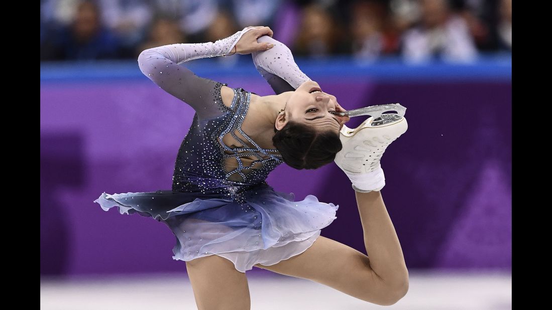 Russia's Evgenia Medvedeva competes in the figure skating single short program. The 18-year-old holds the world records for most points in both the short and long programs.