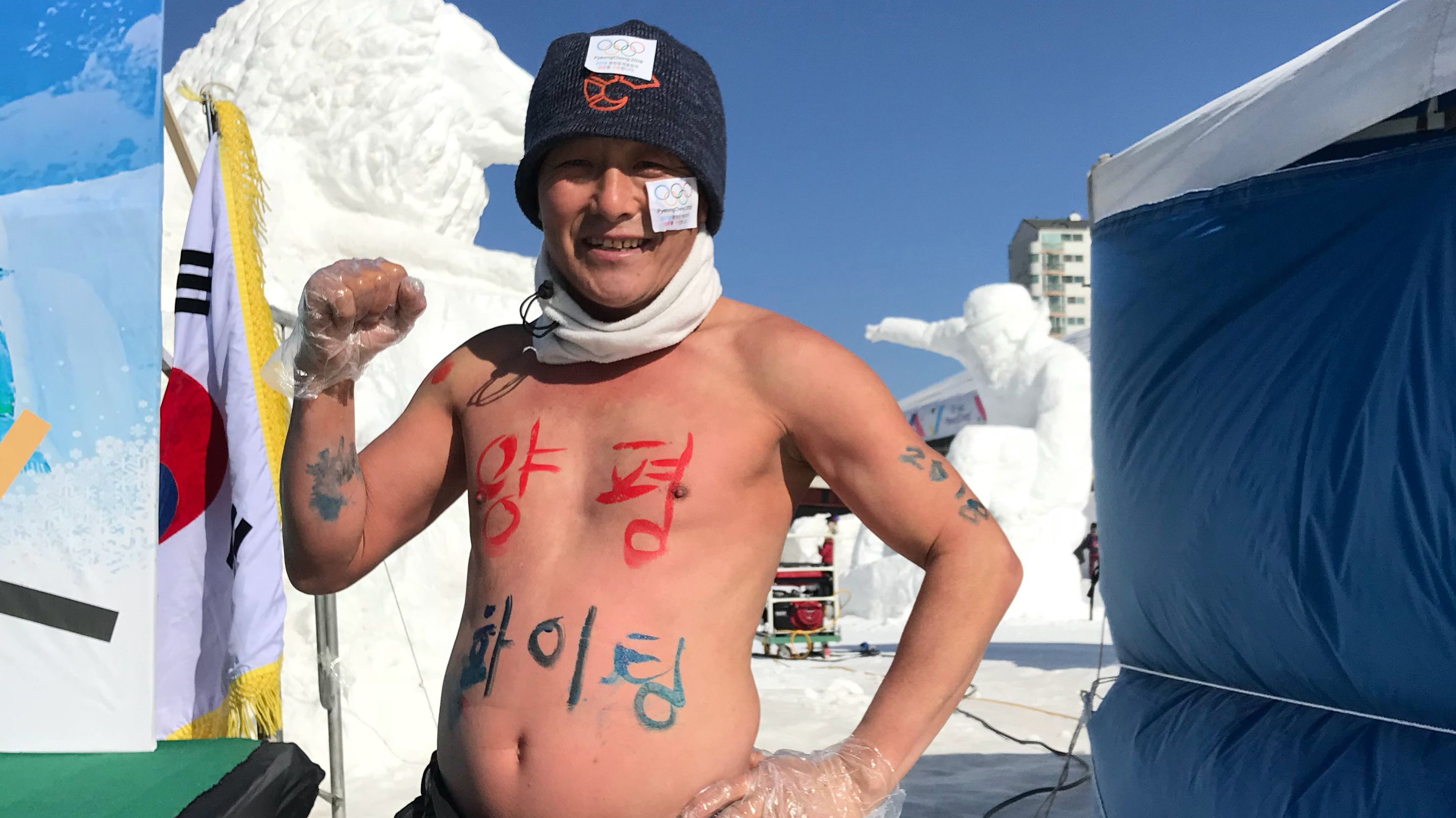 A runner used his chest to declare "Go Yangpyeong!" -- a region in South Korea. 