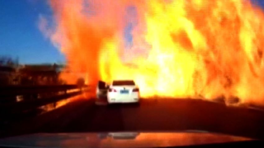 CHINA: TRUCK BURSTS INTO FLAMES AFTER OVERTURNING - A truck loaded with liquefied natural gas overturned on an expressway in China and burst into flames.