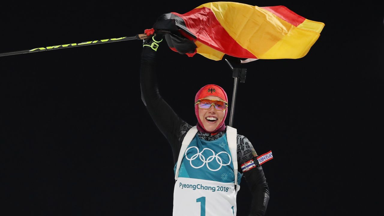Germany's Laura Dahlmeier celebrates after winning her second biathlon event of these Olympics. She is also the first woman to win a pursuit and a sprint at the same Olympics.