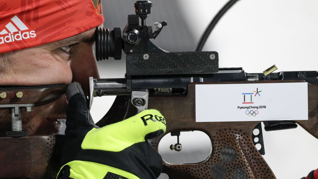 German biathlete Arnd Peiffer aims his rifle during the 12.5-kilometer pursuit.