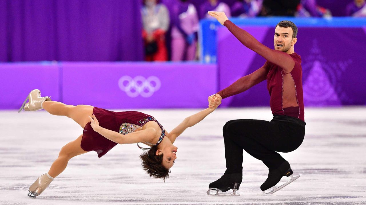 Meagan Duhamel and Eric Radford skate to Adele as Canada win team gold.