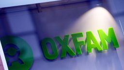 The logo on the front of an Oxfam bookshop is photographed in Glasgow on February 10, 2018. 
The British Government announced late on February 9 it was reviewing all work with Oxfam amid revelations the charity's staff hired prostitutes in Haiti during a 2011 relief effort on the earthquake-hit island. / AFP PHOTO / Andy Buchanan        (Photo credit should read ANDY BUCHANAN/AFP/Getty Images)