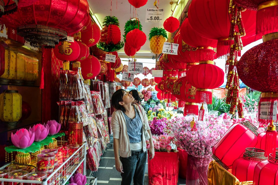 As the Year of the Dog approaches, some shops run by ethnic Chinese in Malaysia are keeping canine models inside instead of displaying them prominently to avoid causing offence in the Muslim-majority country.