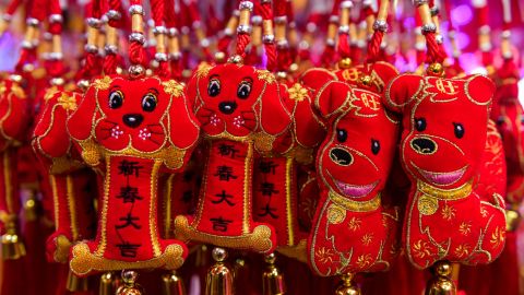 Decorative dog figurines are seen for sale ahead of the Lunar New Year celebrations in Kuala Lumpur's Chinatown on January 26, 2018.

