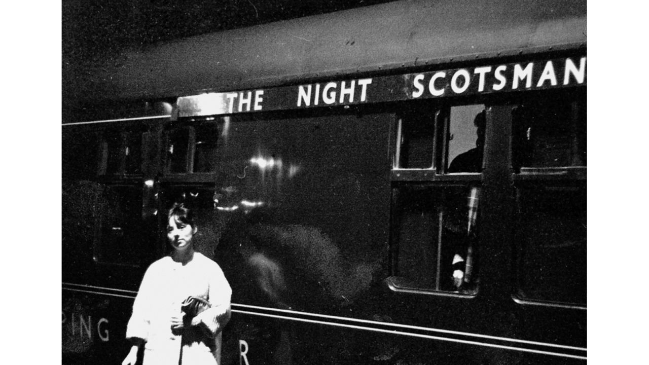 <strong>Railway research: </strong>Meara wove these stories together with the history of Anglo-Scottish sleeper travel. "They make the book what it is," he says. He also conducted extensive research in the National Railway Museum in York. <em>Pictured here: Musician Clifford Bevan took this photograph of his wife, standing beside the Night Scotsman on the last night of their honeymoon.</em>