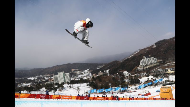American snowboarder Shaun White soars in halfpipe qualifying. He had the highest score of the day.