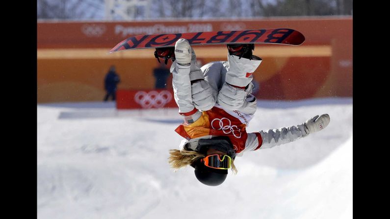 American snowboarder Chloe Kim competes on the halfpipe. Kim, 17, posted the two highest scores of the finals, earning gold with a near-perfect score of 98.25.