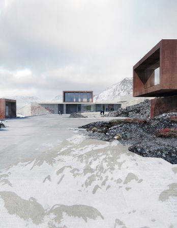 Ny Anstalt's architects designed the arrival hall to look welcoming. They used glass panels so that incoming prisoners and visitors can see the staff inside, making the experience of entering less stressful. 