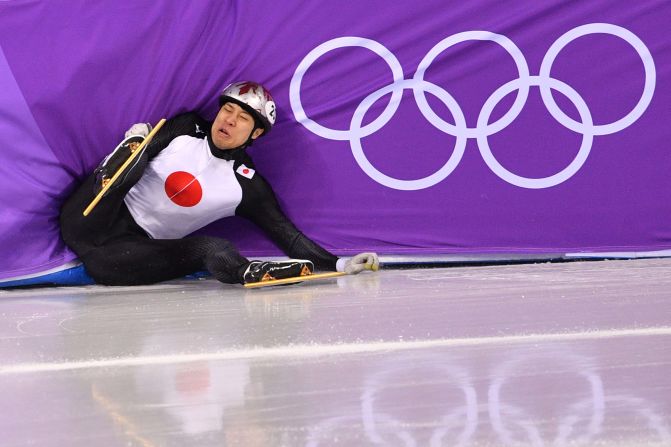 Japan's Ryosuke Sakazume crashes during a short-track speedskating race.