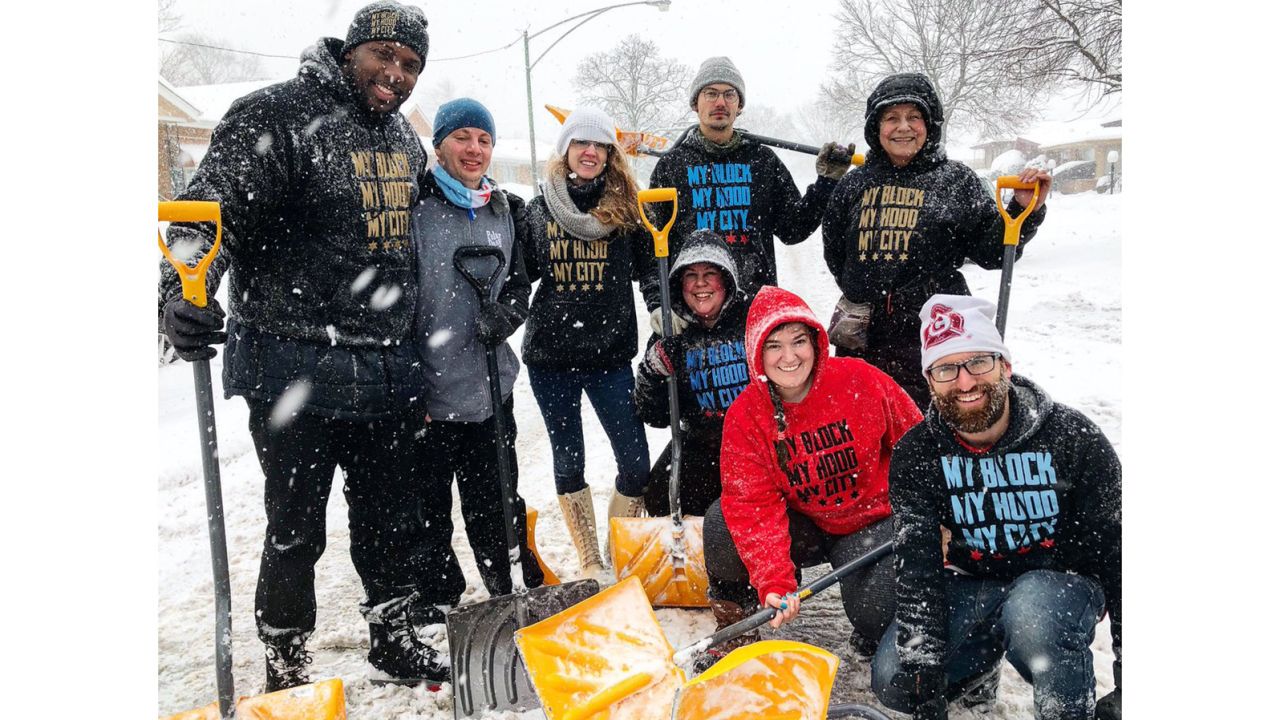 Volunteers help shovel snow for the elderly on the South Side of Chicago.