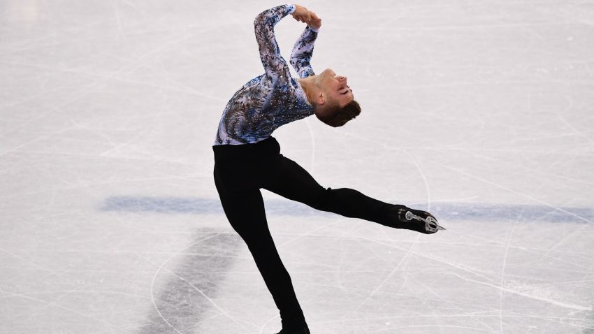 TOPSHOT - USA's Adam Rippon competes in the figure skating team event men's single skating free skating during the Pyeongchang 2018 Winter Olympic Games at the Gangneung Ice Arena in Gangneung on February 12, 2018. / AFP PHOTO / ARIS MESSINIS        (Photo credit should read ARIS MESSINIS/AFP/Getty Images)