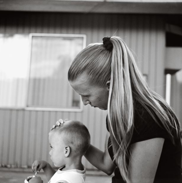 At Walden House FOTEP (Female Offender Treatment Employment Program), a young mother holds her son in El Monte, California.