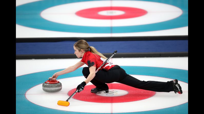 Canada's Kaitlyn Lawes delivers a stone during the gold-medal match in mixed doubles curling. Lawes and John Morris defeated Switzerland.