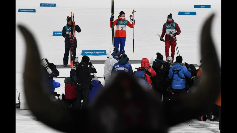 Norway's Johannes Hoesflot Klaebo won gold in a cross-country sprint. Italy's Federico Pellegrino, left, earned the silver. Alexander Bolshunov, from Russia, took the bronze.