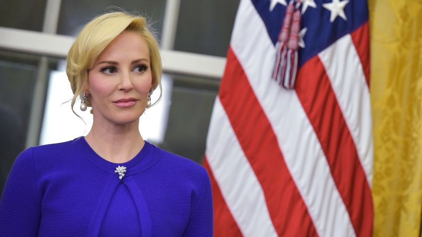 Louise Linton, the fiancee of newly sworn-in Treasury Secretary Steven Mnuchin, watches as speaks after taking the oath of office in the Oval Office of the White House on February 13, 2017 in Washington, DC.