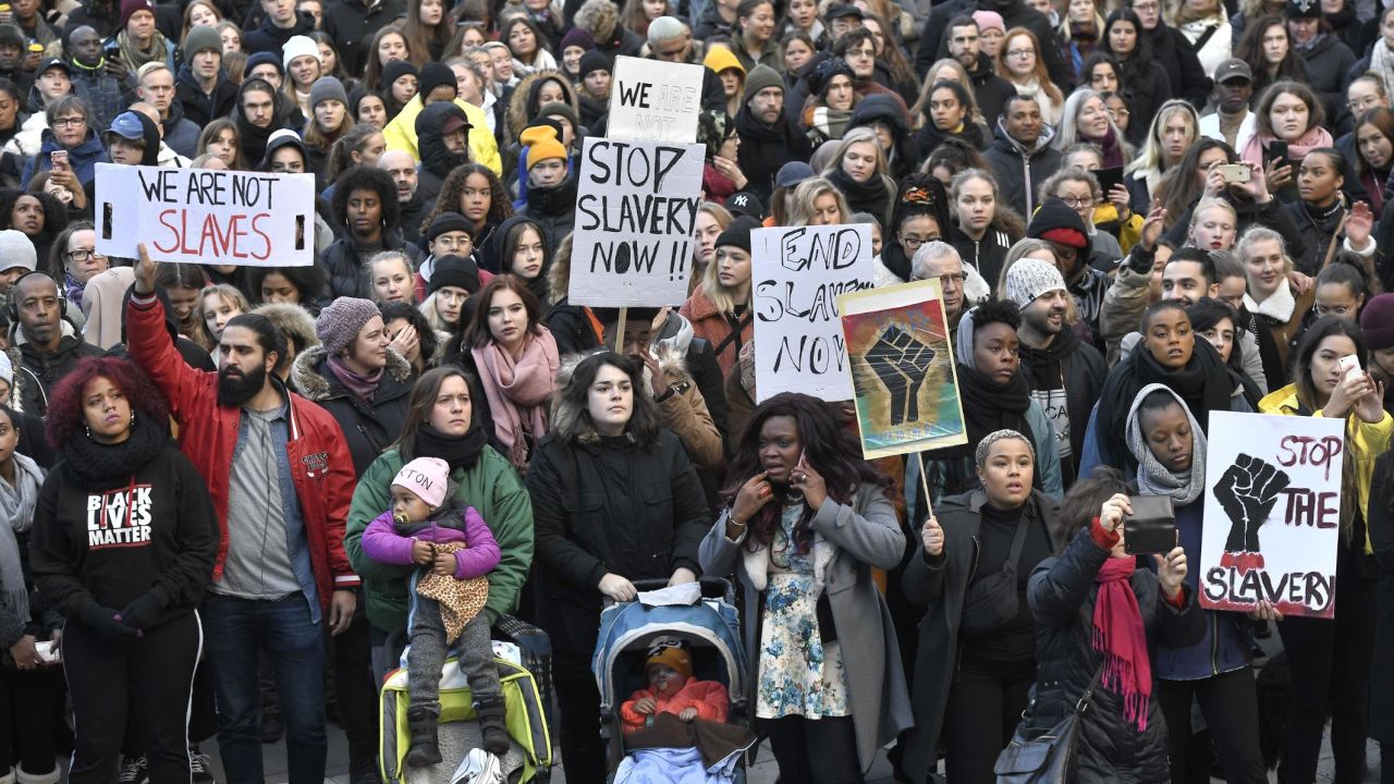 Protestors attend a demonstration in Stockholm, Sweden, in November 2017, against slavery in Libya,
