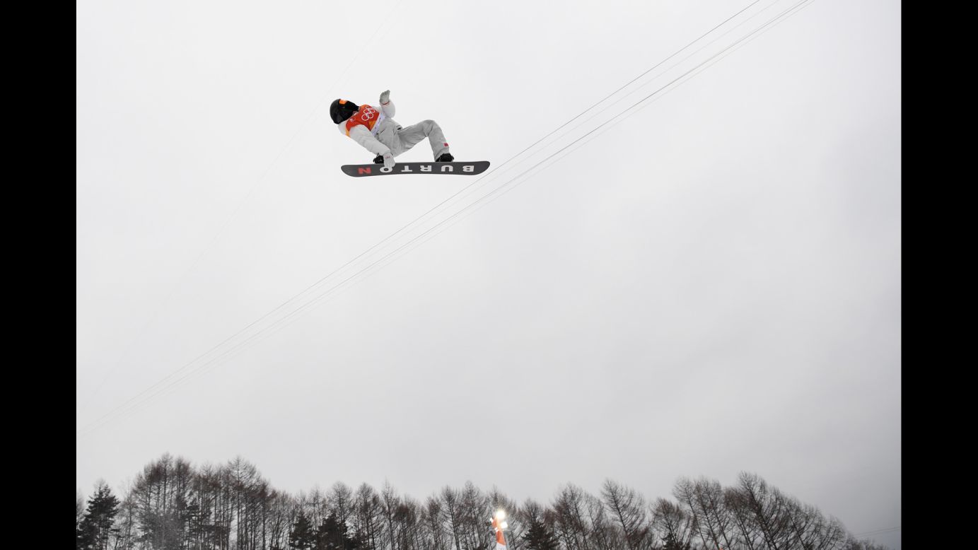 American snowboarder Shaun White, who won gold in the halfpipe, soars in the air during one of his three runs.