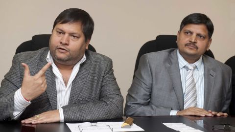 Indian businessmen, Ajay Gupta, right, and younger brother Atul Gupta pictured in March 2011.