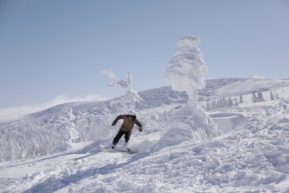 <strong>Powder monster: </strong>A snowboarder cruises through the powder amidst the snow monsters at the Zao Onsen Ski Resort. 