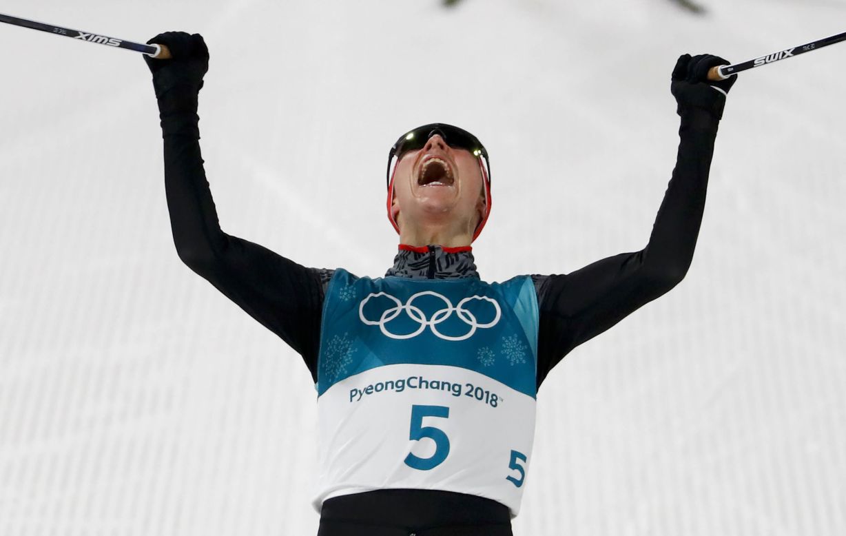 German Eric Frenzel celebrates after winning gold in the Nordic combined. He also won the event in 2014.