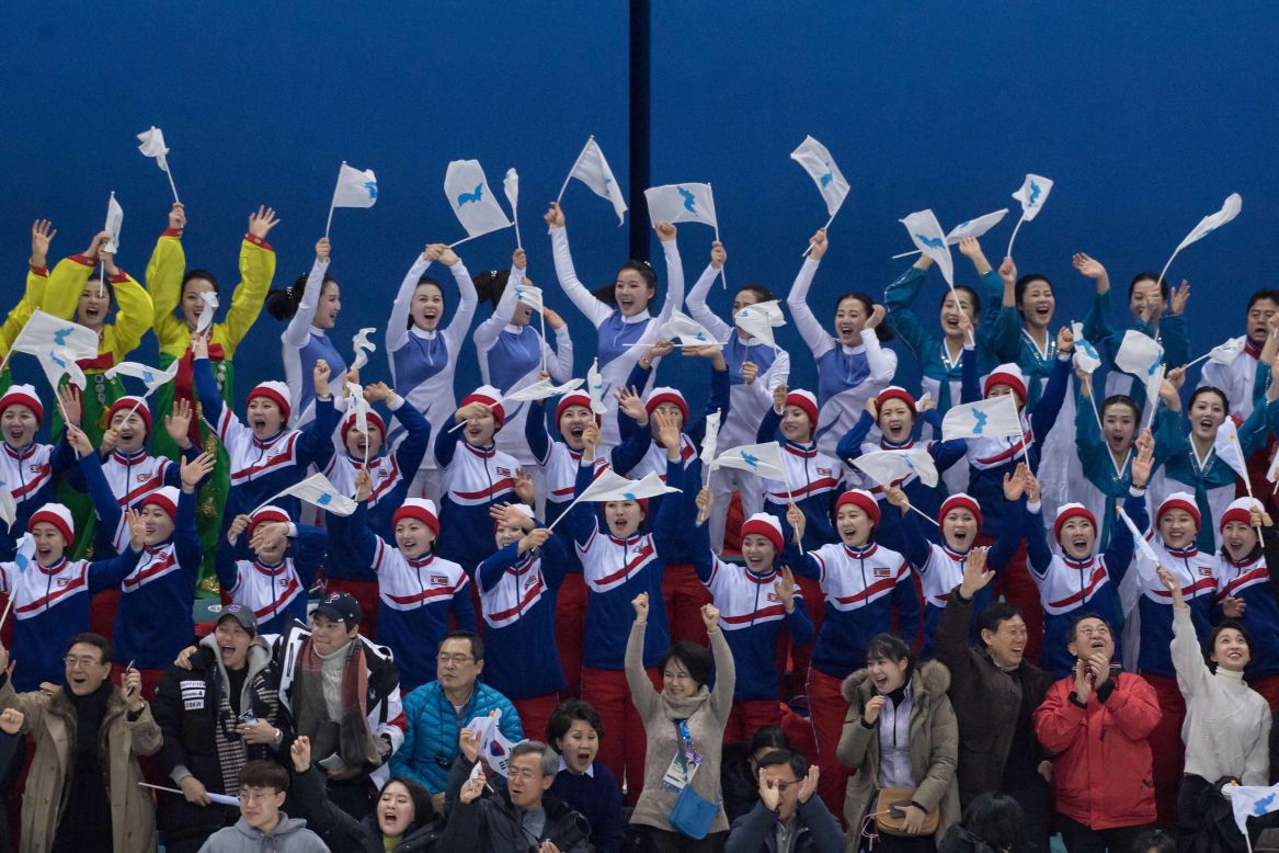 North Korean cheerleaders react after the Korean team scored against Japan.