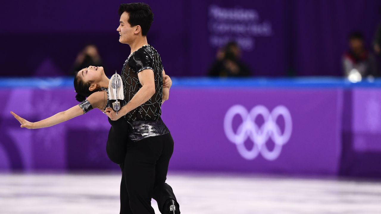 North Korea's Ryom Tae Ok (L) and North Korea's Kim Ju Sik competed in the pair skating short program event.