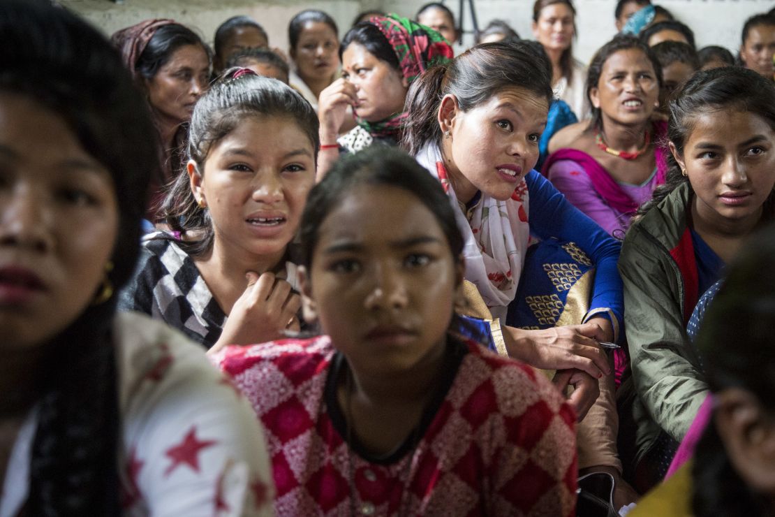 Nepalese Christians react to graphic pictures of aborted fetuses during a lecture by Soman Rai.