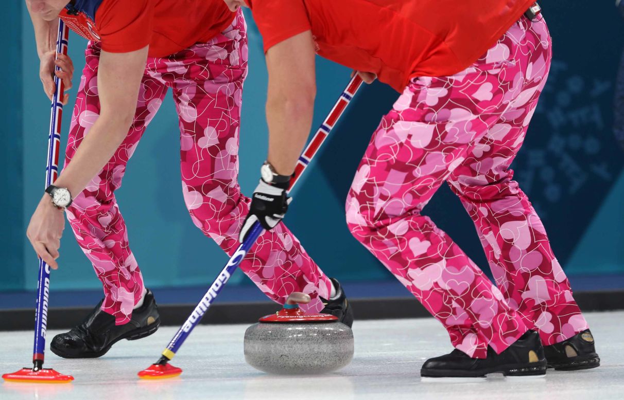 The men's curling team from Norway sports some pants with a Valentine's Day theme.