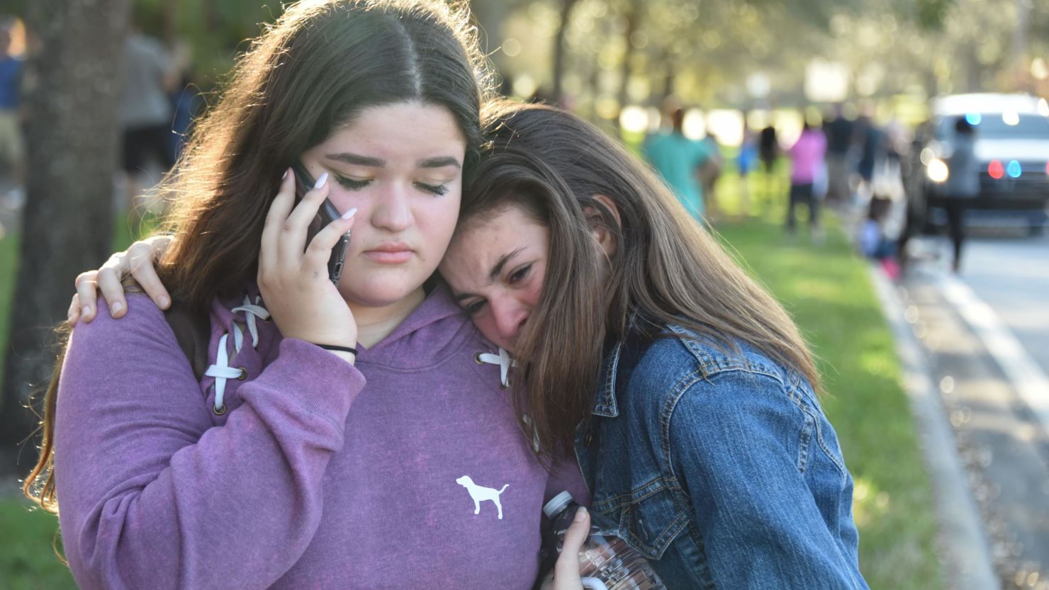 Students react following a shooting at Marjory Stoneman Douglas High School in Parkland, Florida.