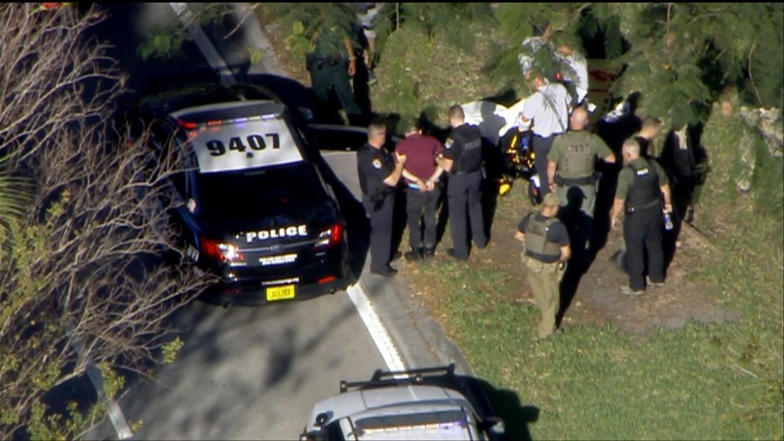 The suspect, 19-year-old former student Nikolas Cruz, is taken into custody by authorities. Cruz was apprehended off of the campus.