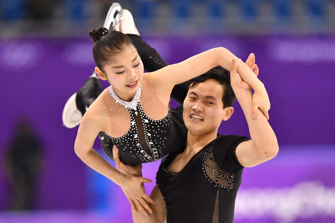 North Korean figure skaters Ryom Tae Ok and Kim Ju Sik compete in the pairs event.